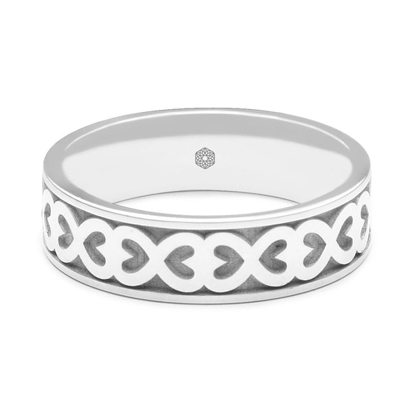 Horizontal Shot of Mens Platinum 950 Flat Court Wedding Ring With Hearts Pattern