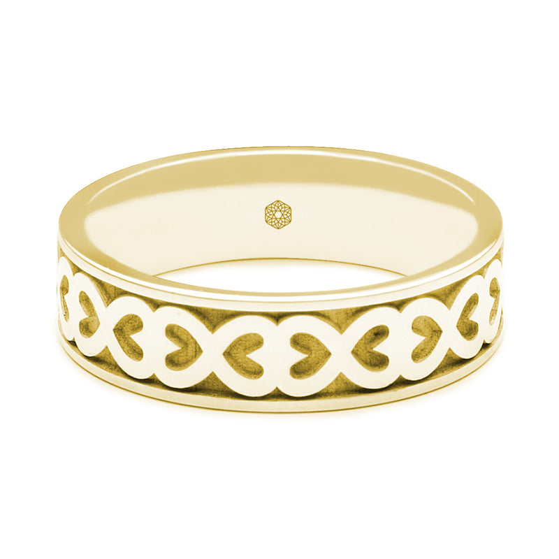 Horizontal Shot of Mens 18ct Yellow Gold Flat Court Ring With Hearts Pattern