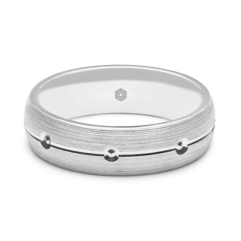 Horizontal Shot of Mens Matte Finish 18 ct White Gold Court Shape Wedding Ring With Central Groove and Diamond Cut Details